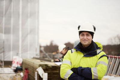 Engineer standing at building site