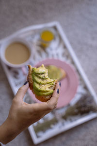 Close-up of person holding food