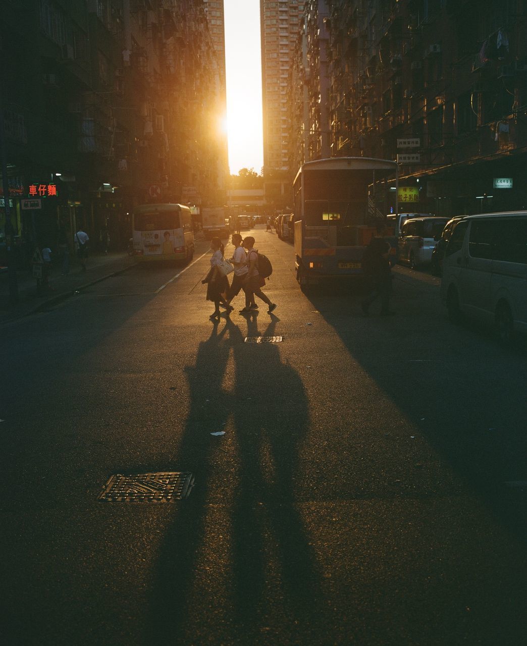 SHADOW OF PEOPLE ON STREET