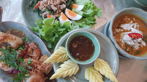 High angle view of food served on table