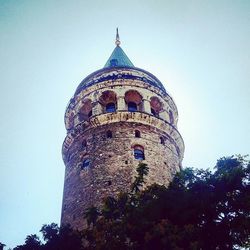 Low angle view of old building against sky