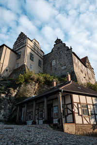 Low angle view of old building against sky