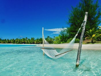 Scenic view of sea against clear blue sky