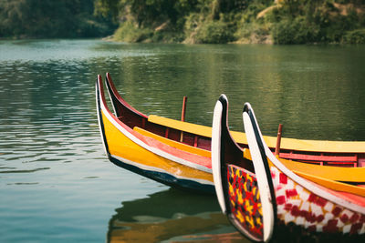 Boat moored in lake