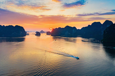 Scenic view of sea against sky during sunset