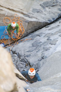 Rock climber crack climbing on the nose, el capitan in yosemite