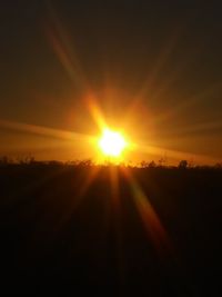 Scenic view of silhouette landscape against sky during sunset