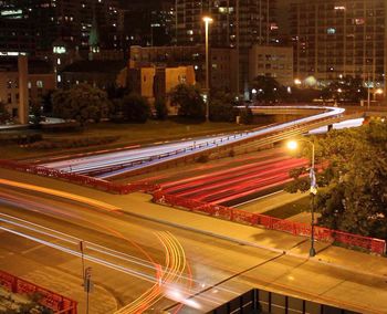 High angle view of light trails on road at night