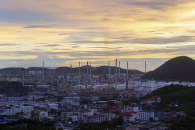 High angle view of buildings against sky at sunset