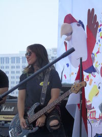 Young woman playing guitar