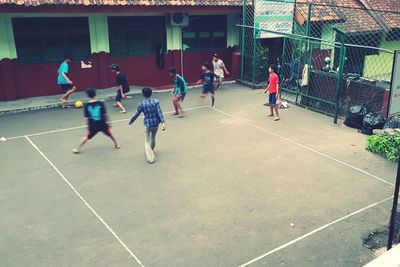 Group of people playing soccer