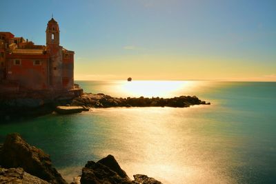 Scenic view of sea at sunset