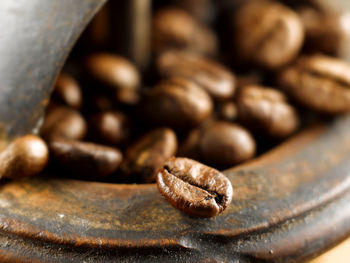 Close-up of coffee beans on table