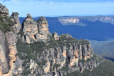 Panoramic view of rock formations against sky