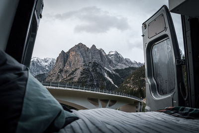 Scenic view of mountains seen through van