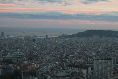 High angle view of buildings against sky during sunset