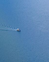 Sailboat sailing in sea