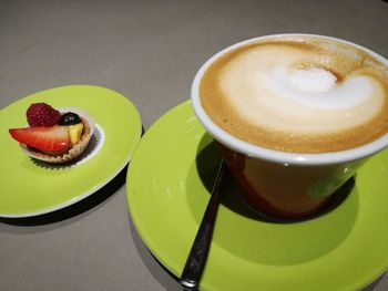 High angle view of cappuccino on table