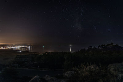 Scenic view of illuminated star field against sky at night