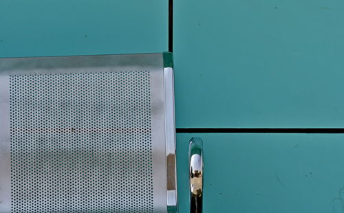 Close-up of blue metal window