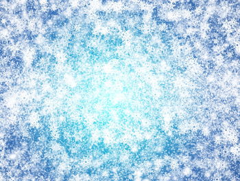 Full frame shot of snow flakes