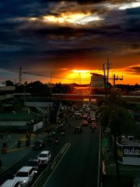 High angle view of traffic on road at sunset