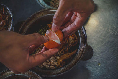 Close-up of person preparing food