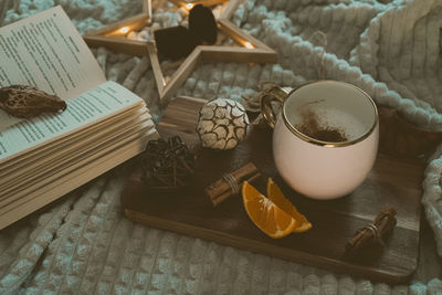 High angle view of food on table and a book