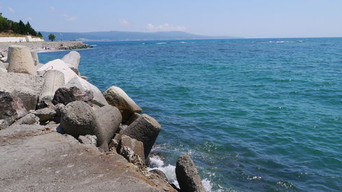 View of calm blue sea against sky