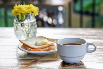 Close-up of coffee served on table