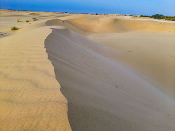 Sand dunes in desert