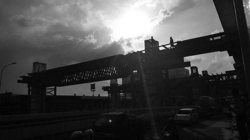 Panoramic view of city street against sky