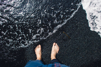 Low section of man at beach