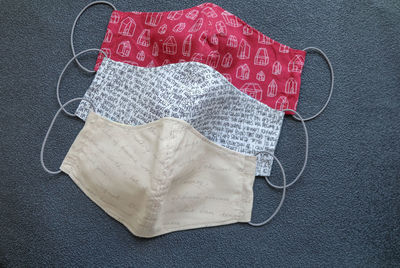 High angle view of heart shape on white fabric