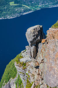 High angle view of rock formations on sea shore