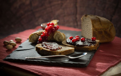 Close-up of fruits in plate on table