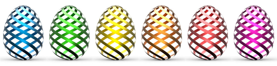 Close-up of multi colored candies against white background