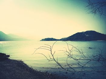 Scenic view of lake with mountains in background