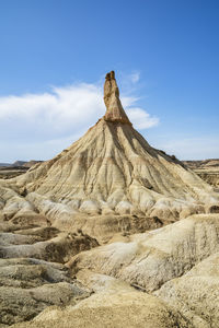 Scenic view of rock formations against sky