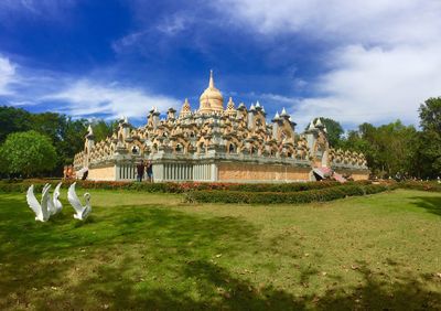 View of temple against cloudy sky