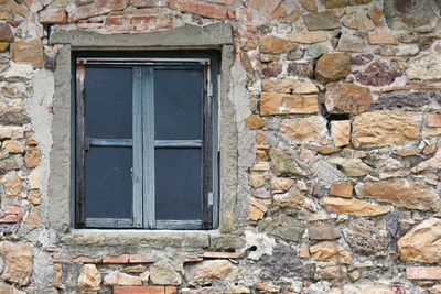 Closed window of old building