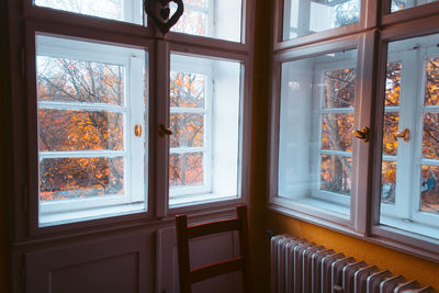 Close-up of glass window of house