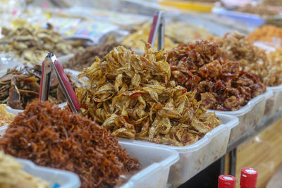 Closeup of deep fried fish, shrimp - traditional vietnamese cuisine in dam market, nha trang city