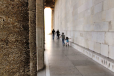 People walking in corridor