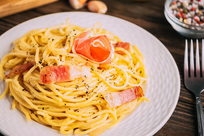 Close-up of noodles in plate on table