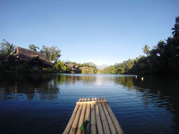 Scenic view of river against clear sky