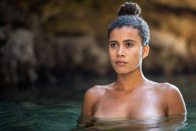 Young woman in sea