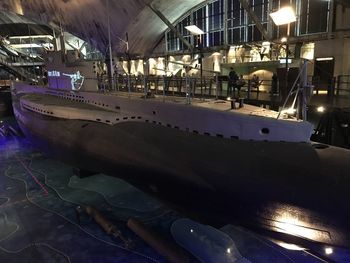 Illuminated harbor in museum at night