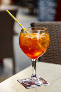 Close-up of wineglass on table