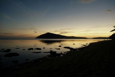 Scenic view of sea at sunset